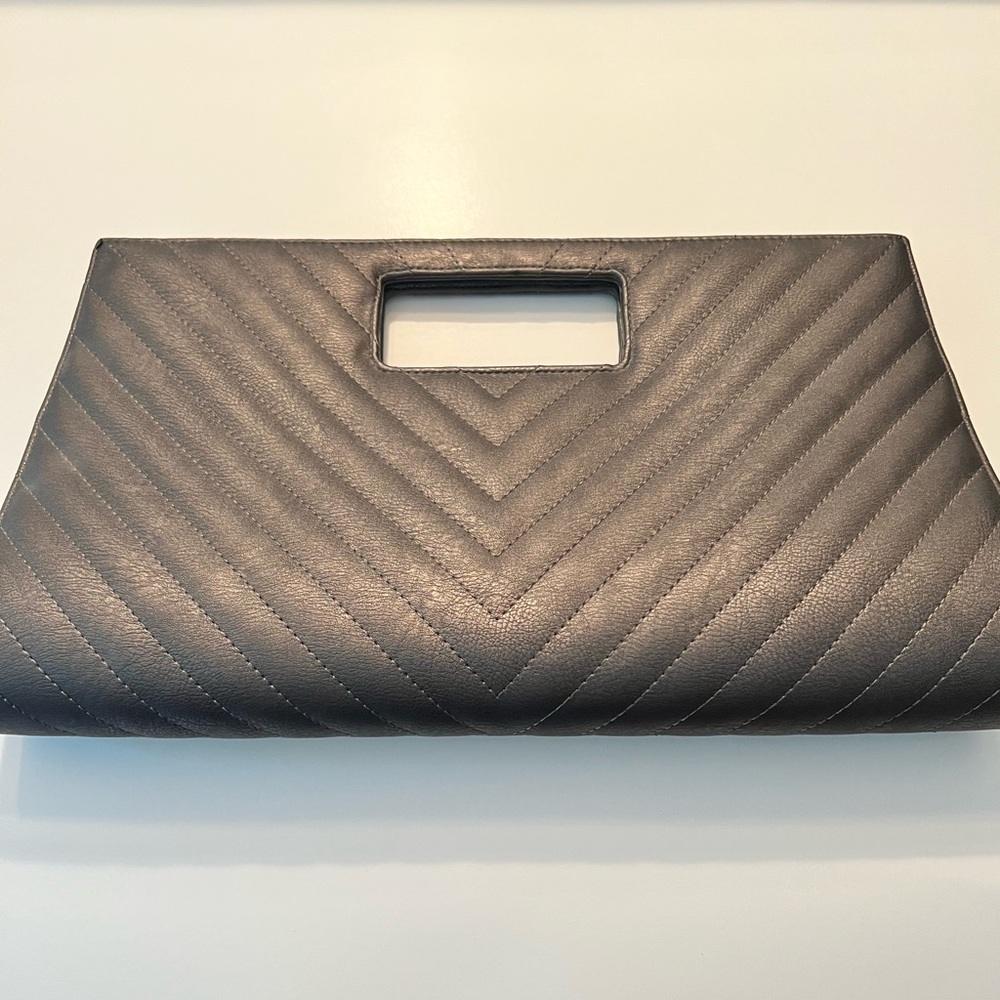 Charming Charlie Oversized Faux Leather Clutch.